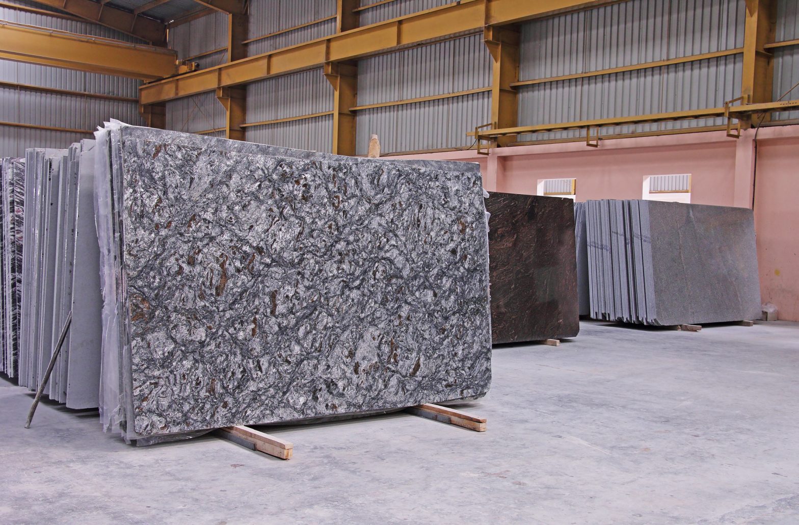 polished granite slabs in a warehouse